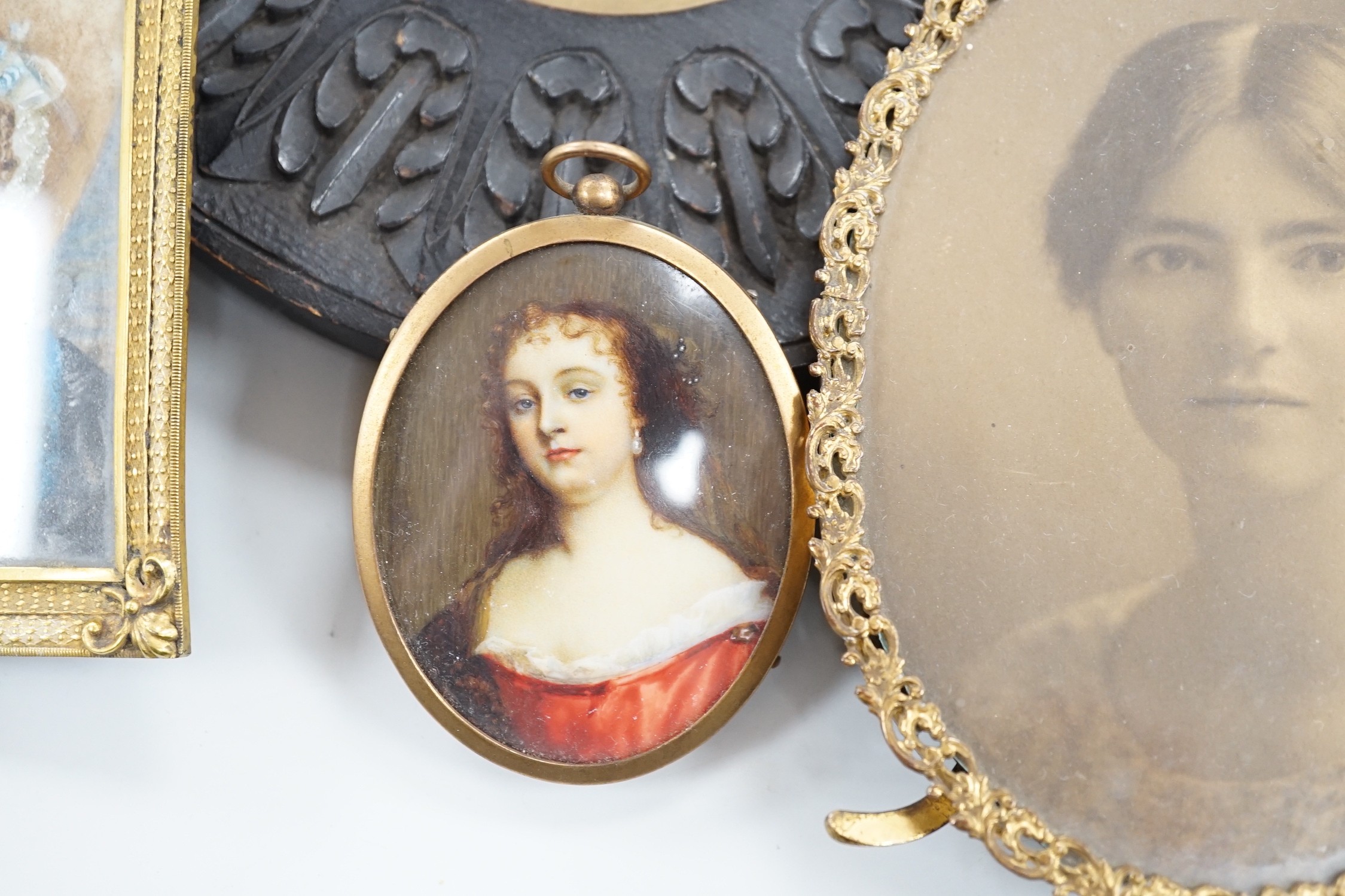 Continental School, 18th century, portrait miniature on ivory, Portrait of a Lady in a red dress, together with six other portraits. To include the subject of military interest: a portrait watercolour of General Isaac Br